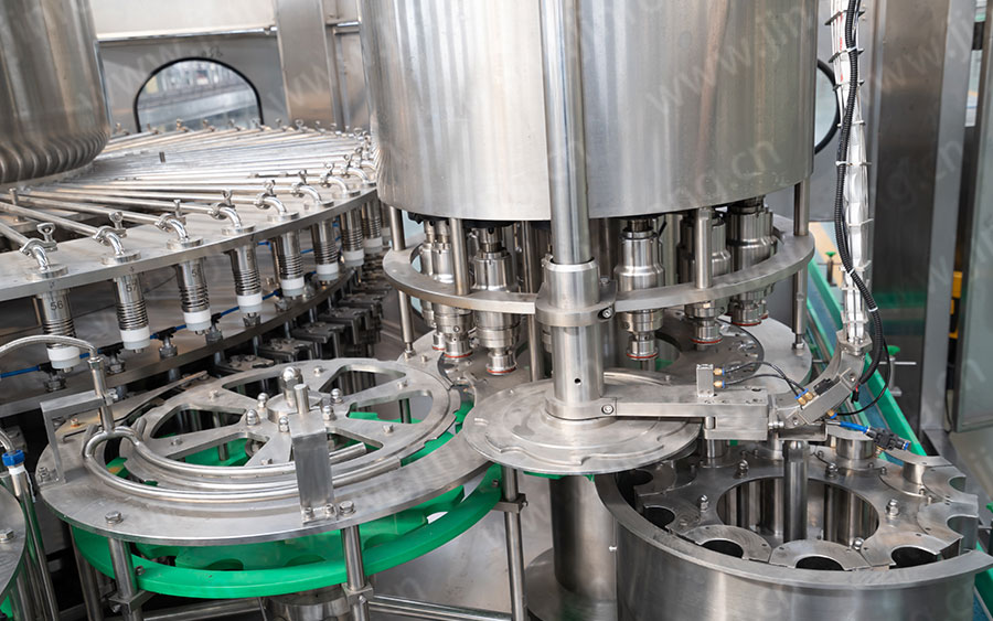 果汁灌裝機(jī)封蓋部分 果汁灌裝機(jī)封蓋部分